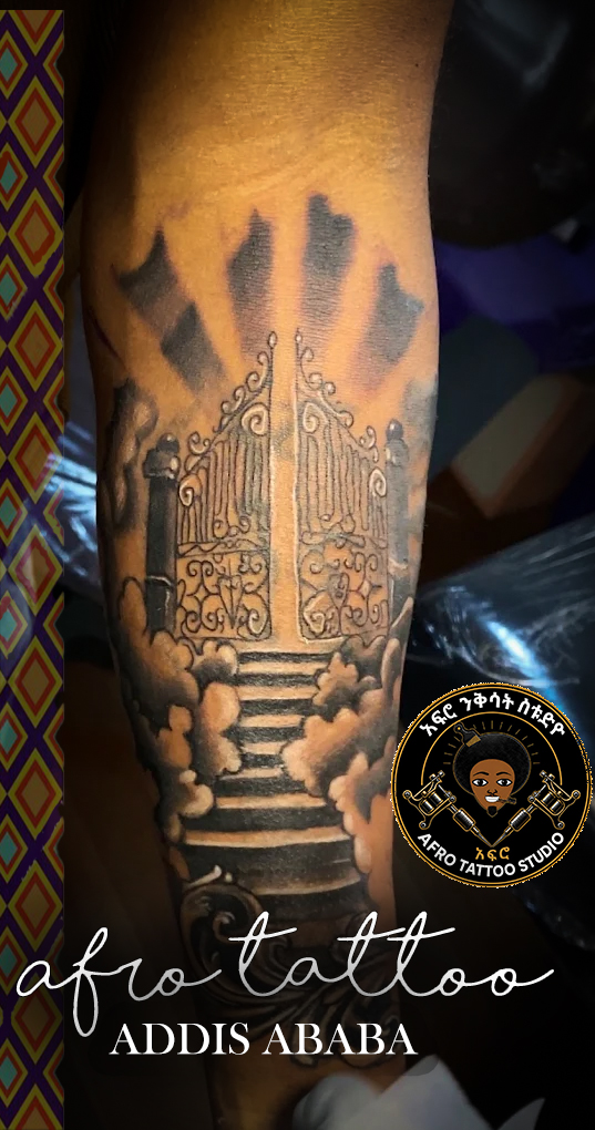 Black & Grey tattoo by Afro Tattoo in Addis Ababa
