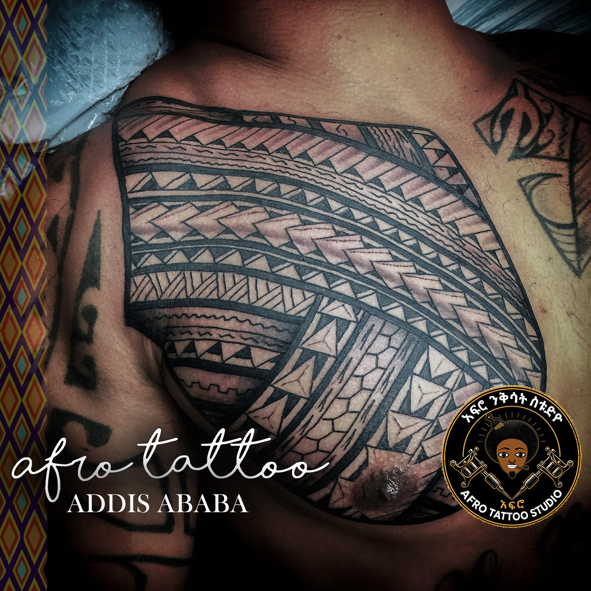 Tribal tattoo by Afro Tattoo in Addis Ababa